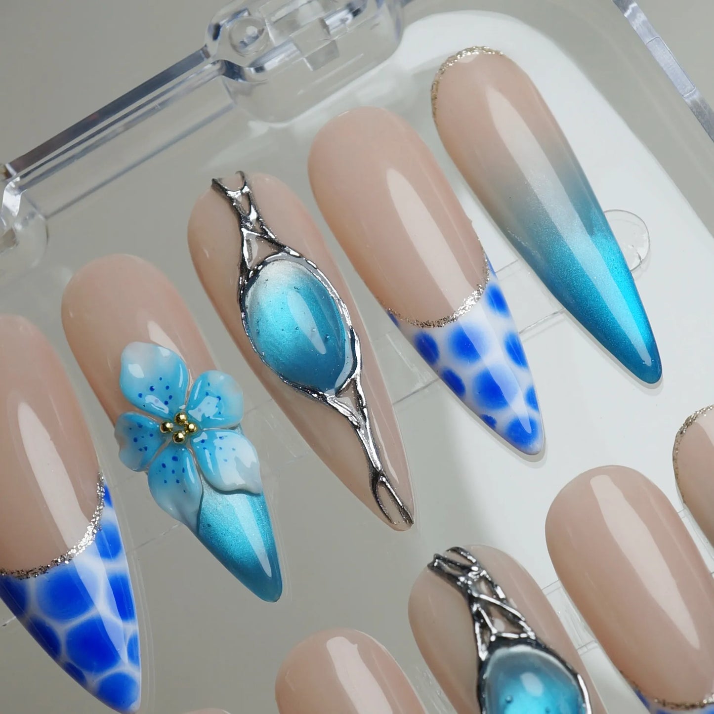 Aqua Circuit close-up detail showing chrome structural accents and fluid aqua blue gradient nail art – Donailsart