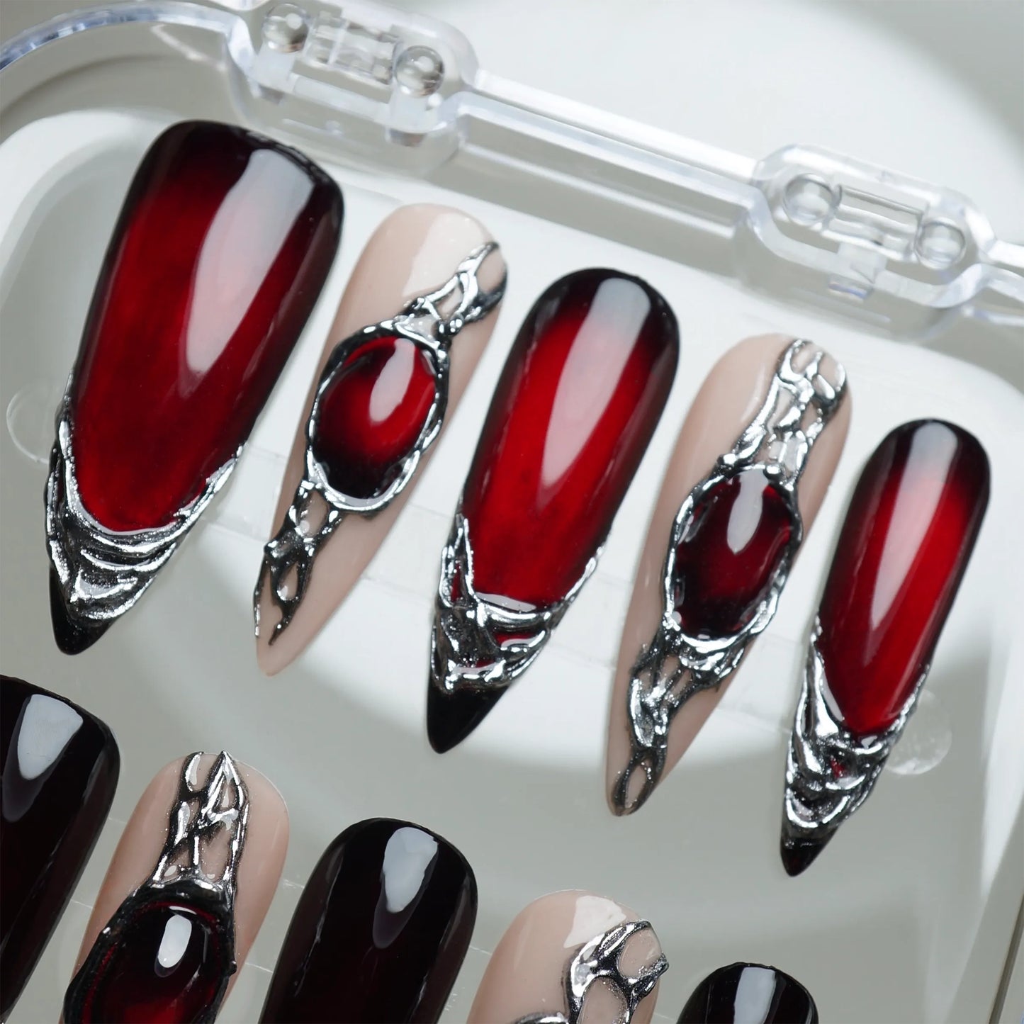 Red Alloy nail art detail view featuring sharp crimson and chrome engineered press-on nail design – Donailsart
