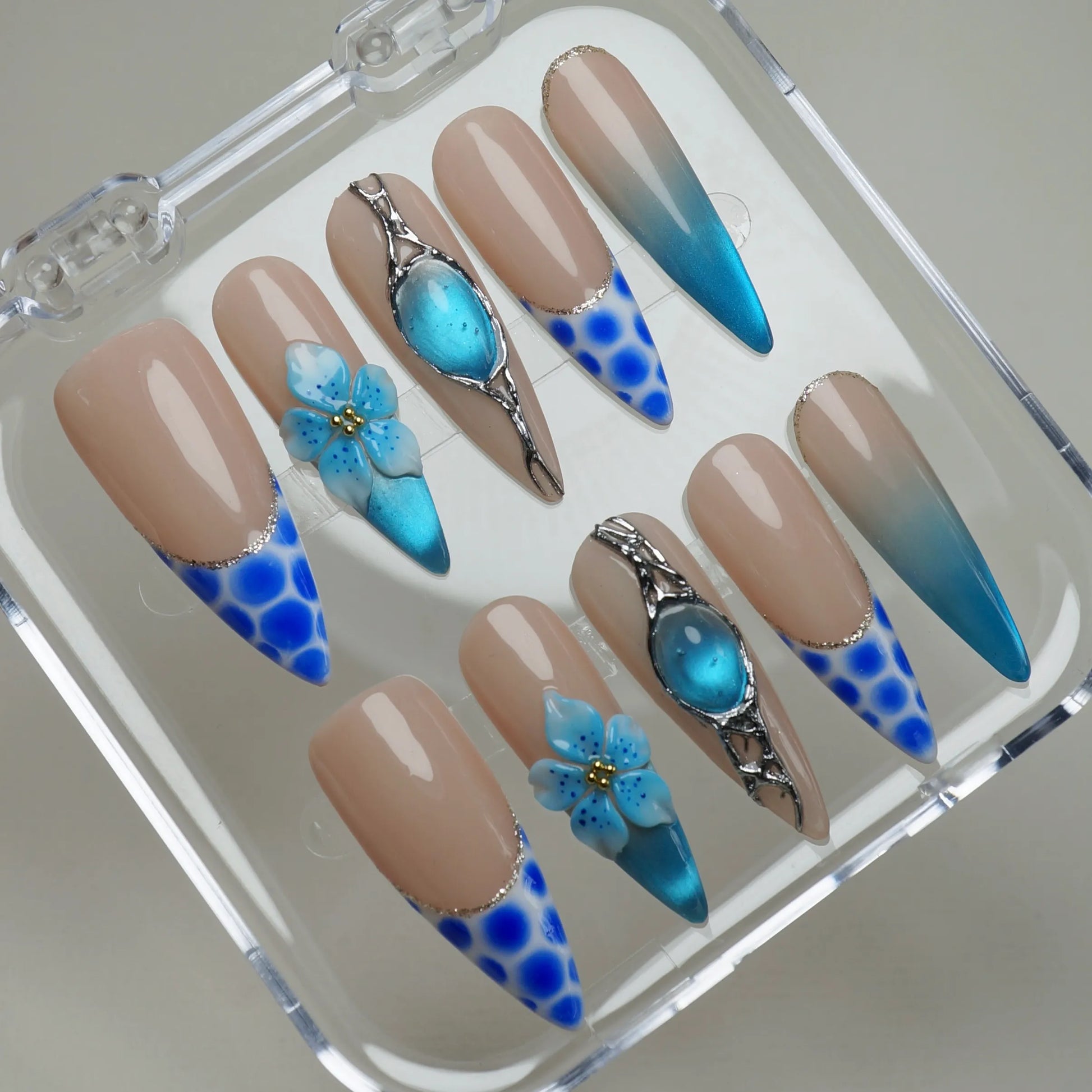 Aqua Circuit press-on nails on display showing the full blue gradient chrome nail art collection – Donailsart