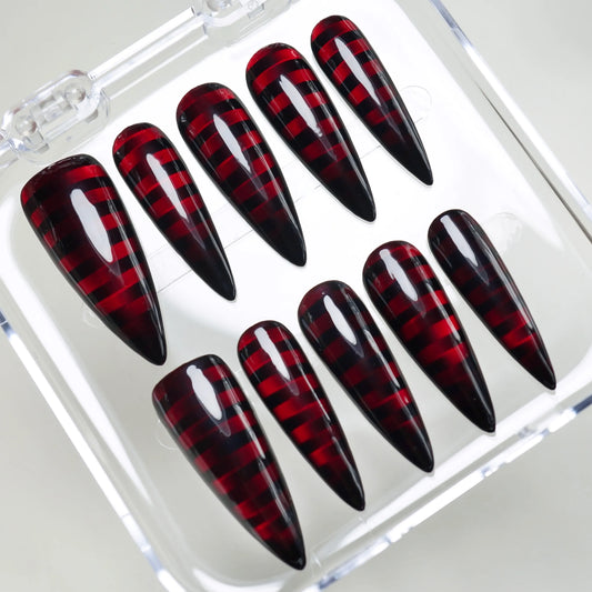 Riot Grid press-on nails on display showing the full black and red grid nail art collection – Donailsart