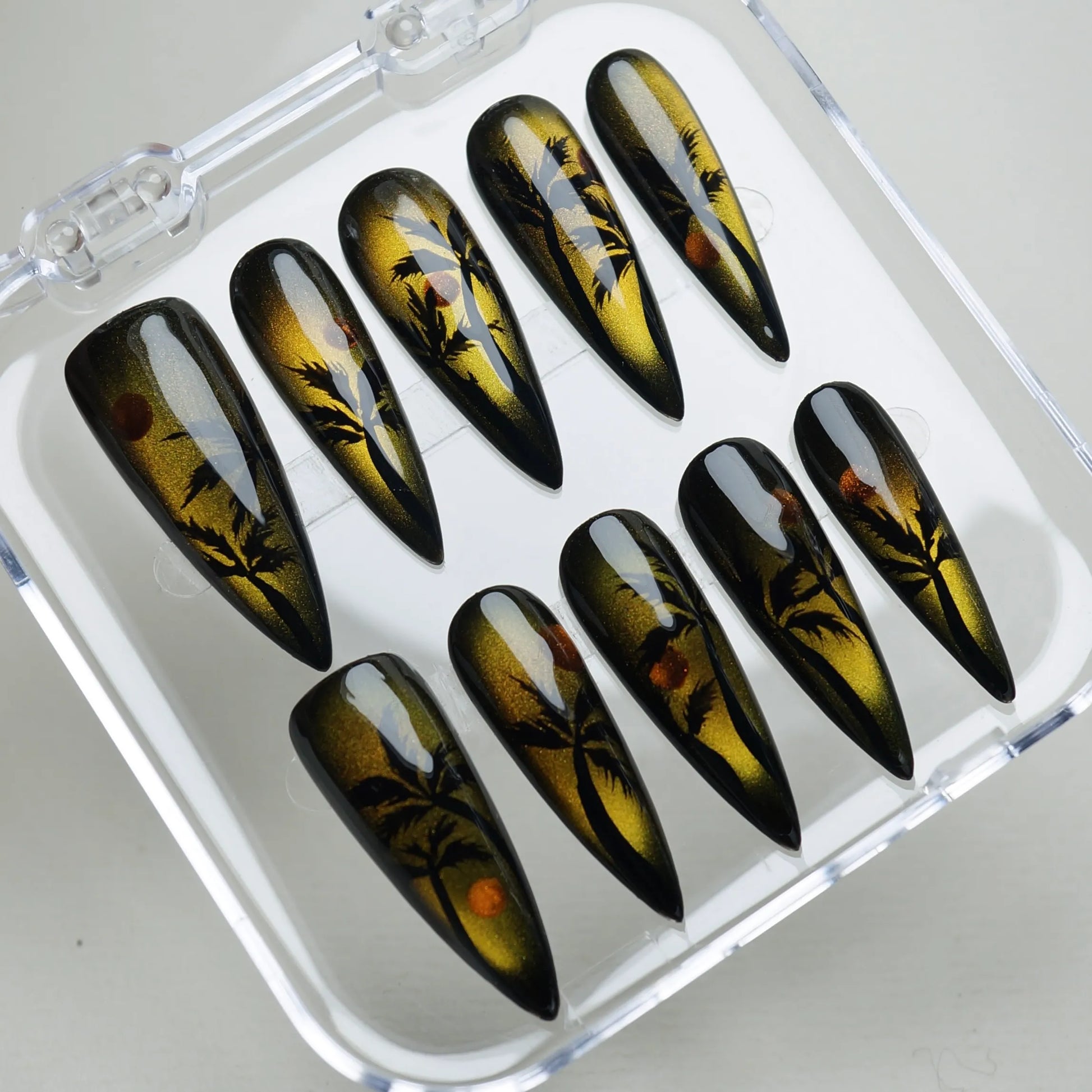 Island Sunrise press-on nails on display showing the full tropical beach horizon nail art collection – Donailsart