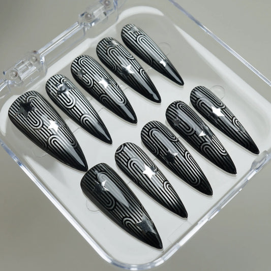 Stellar Maze press-on nails on display showing the full black and silver geometric nail art collection – Donailsart