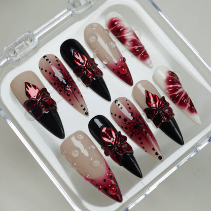Rouge Relic press-on nails on display showing the full dark romantic floral nail art collection – Donailsart