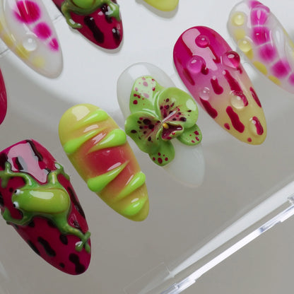 Colorful butterfly-shaped nail art designs on a white background