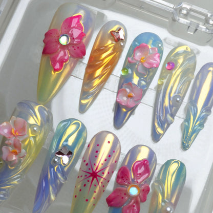 Press-on summer flower nails with transparent shimmer, hand-crafted petals, and delicate dewdrop effects