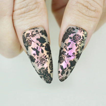 Opaline Veil close-up detail showing intricate black floral lace pattern over an iridescent pink-champagne pearlescent nail – Donailsart