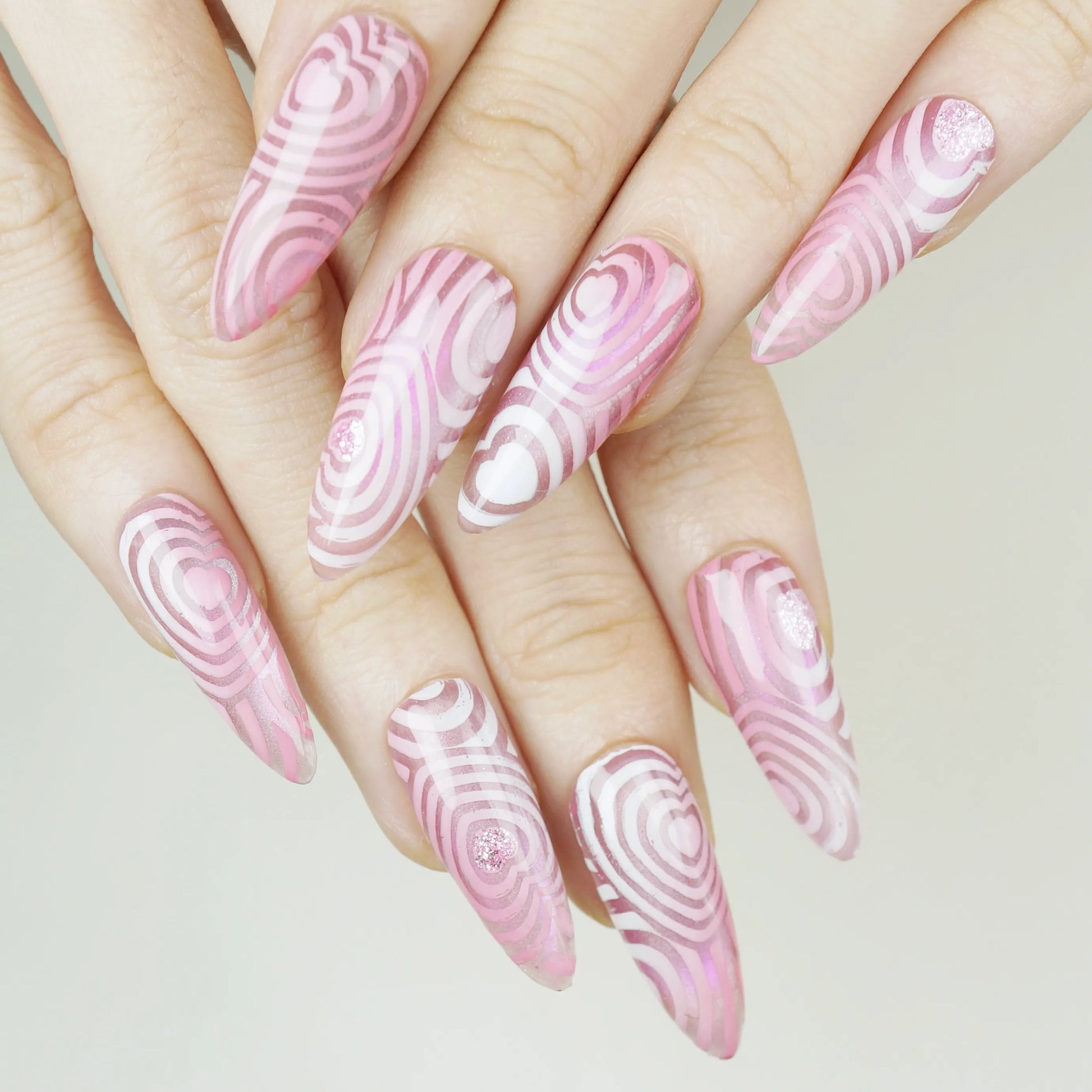 Pink Labyrinth press-on nails on hand – Donailsart