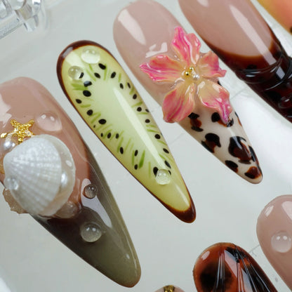 Unique summer nails with a playful mix of textures and patterns, perfect for beach vibes and sunny days.