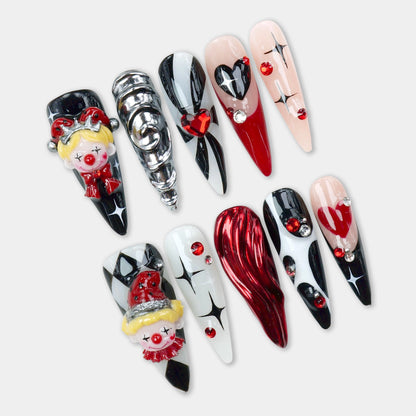 Bold clown nails by Donailsart, featuring 3D clown faces, diamond patterns, and heart accents in red, black, and white tones.