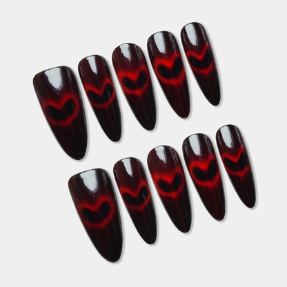 Heartburn press-on nail set by Donailsart – deep red nail art
