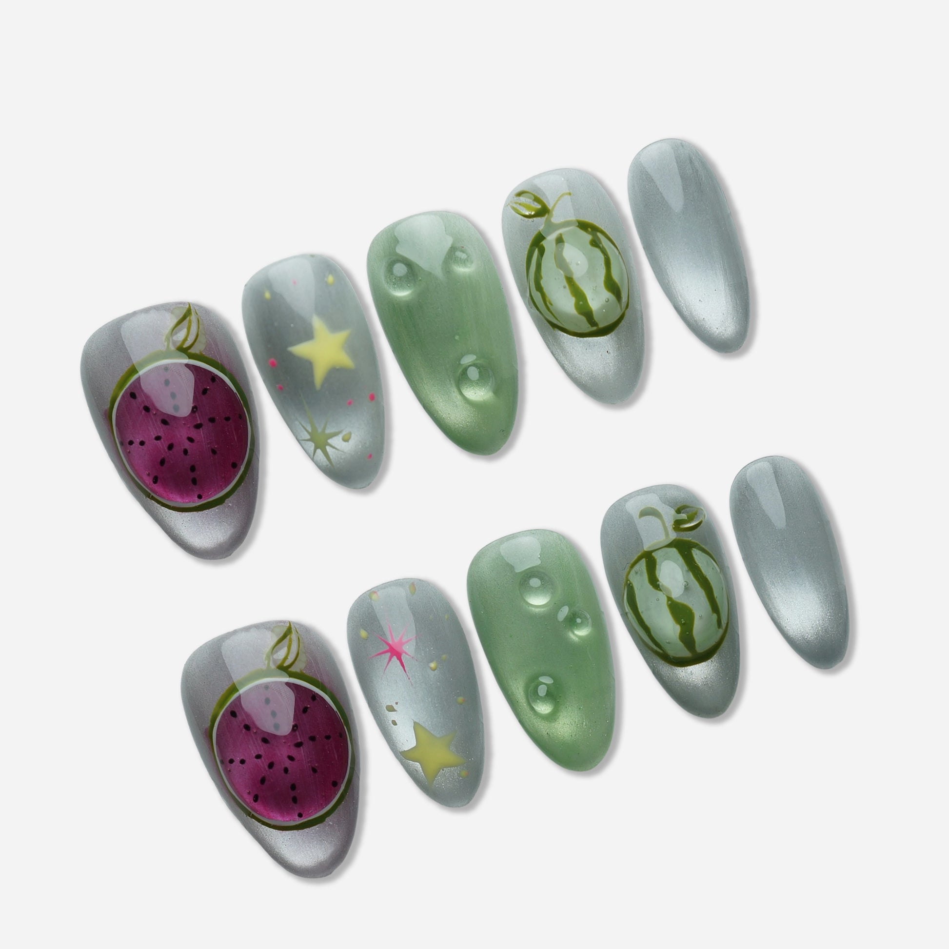 A26 | Melon Mirage press-on nail set by Donailsart – chrome silver base nails with translucent green tones, surreal glowing fruit illustrations, and cosmic star accents