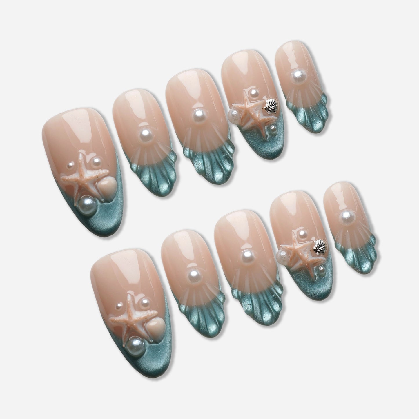 B2 | Ocean Pearl press-on nail set by Donailsart – soft nude to ocean blue gradient nails with sculpted shell textures, delicate pearls, and starfish accents