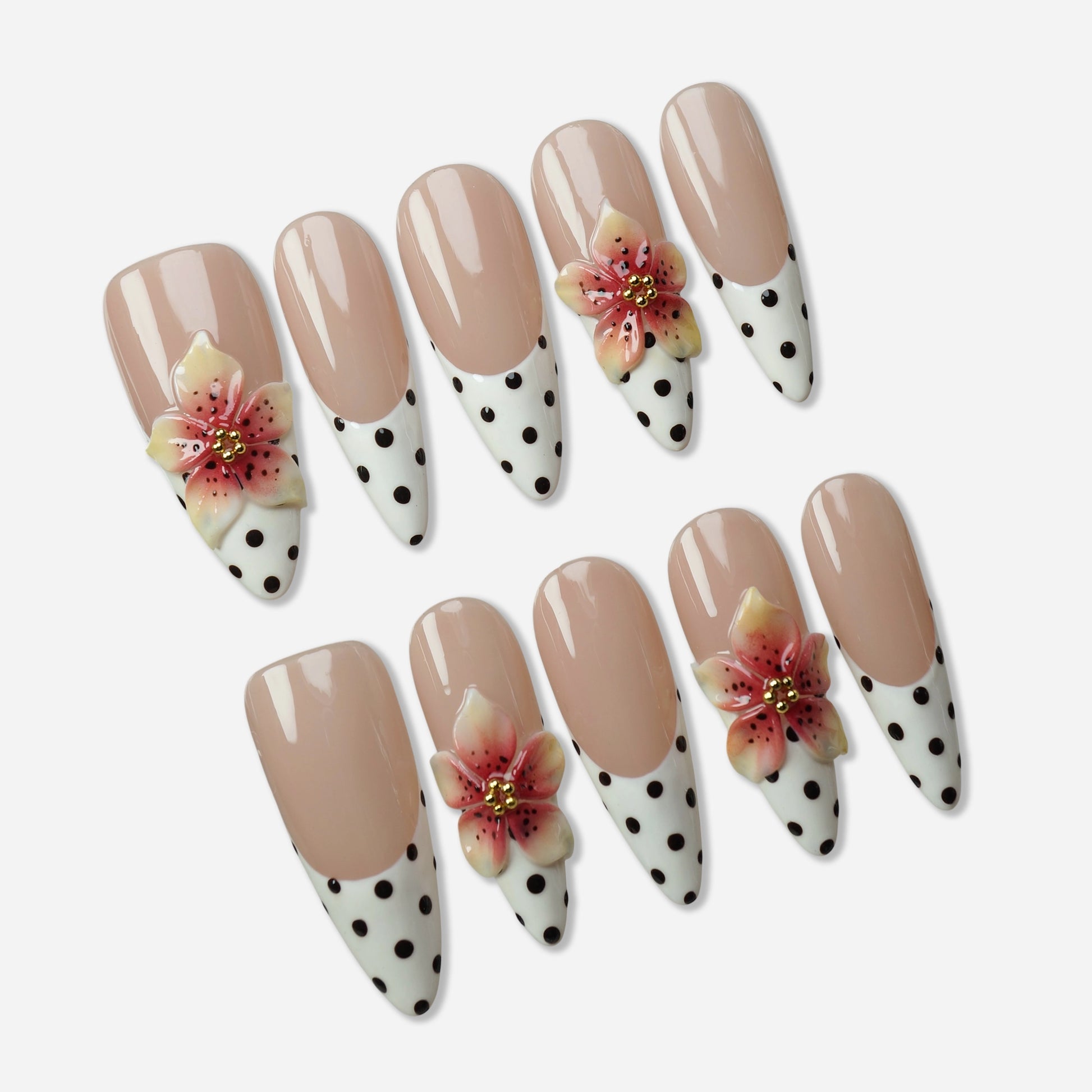 Petal Poise press-on nail set by Donailsart – soft nude base nails with polka-dot French tips and hand-sculpted 3D floral petal accents