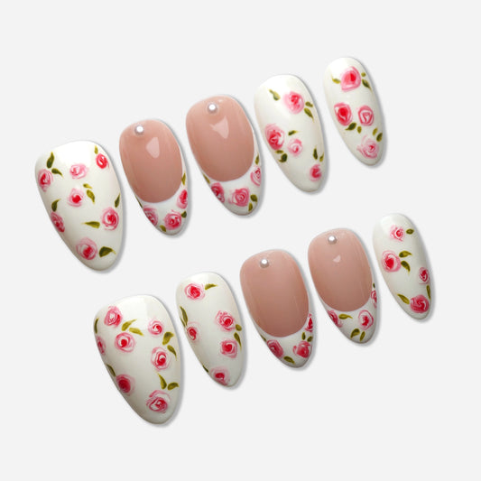 A11 | Porcelain Bloom press-on nail set by Donailsart – clean nude base nails with delicate hand-painted rose floral details and soft romantic finish