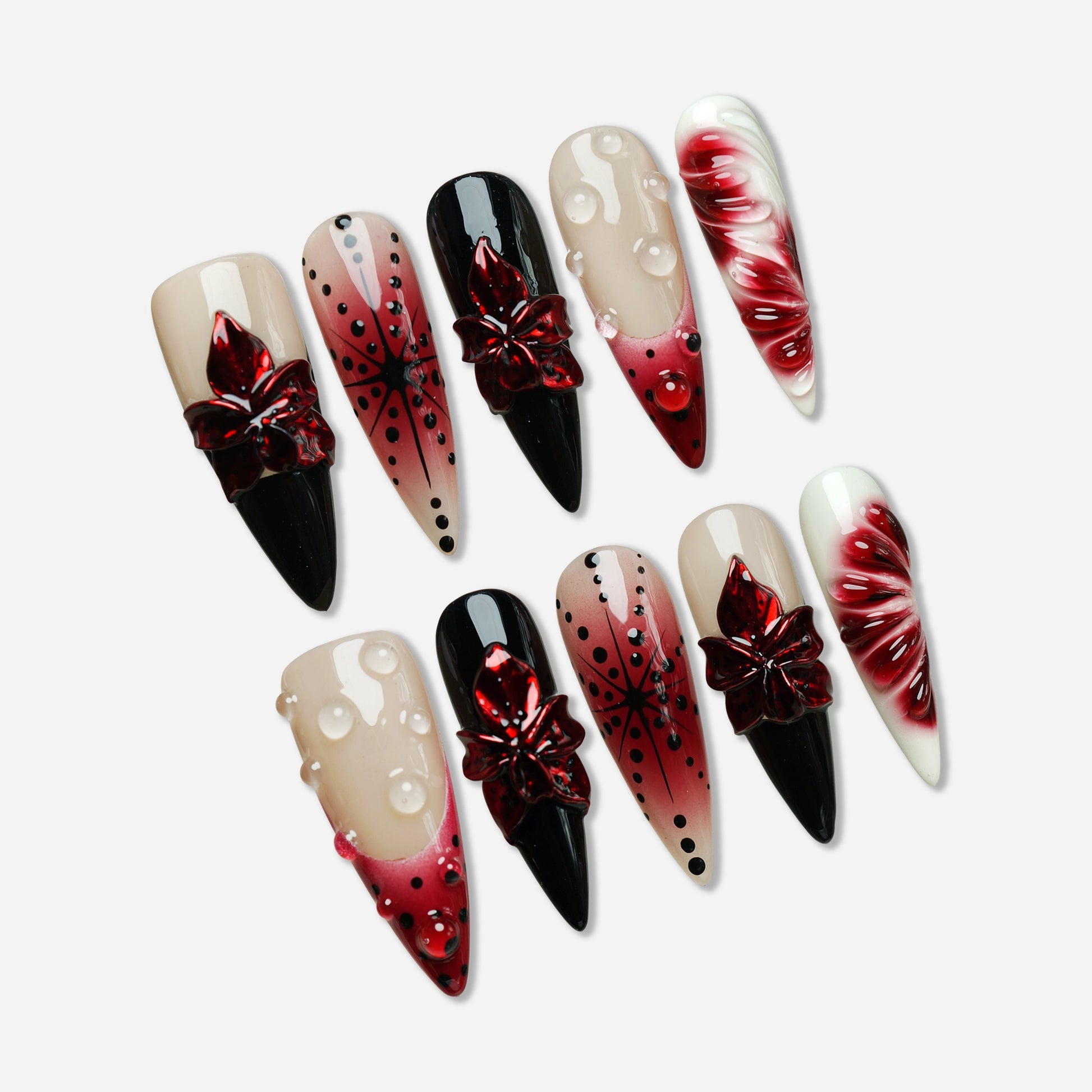 Rouge Relic press-on nail set by Donailsart – nude and deep rouge jelly nails with glossy black contrast, sculpted floral accents, and clear gel droplets