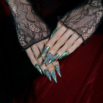 Hanging Garden green chrome gothic press-on nails with sculpted silver ornaments, full set on hands