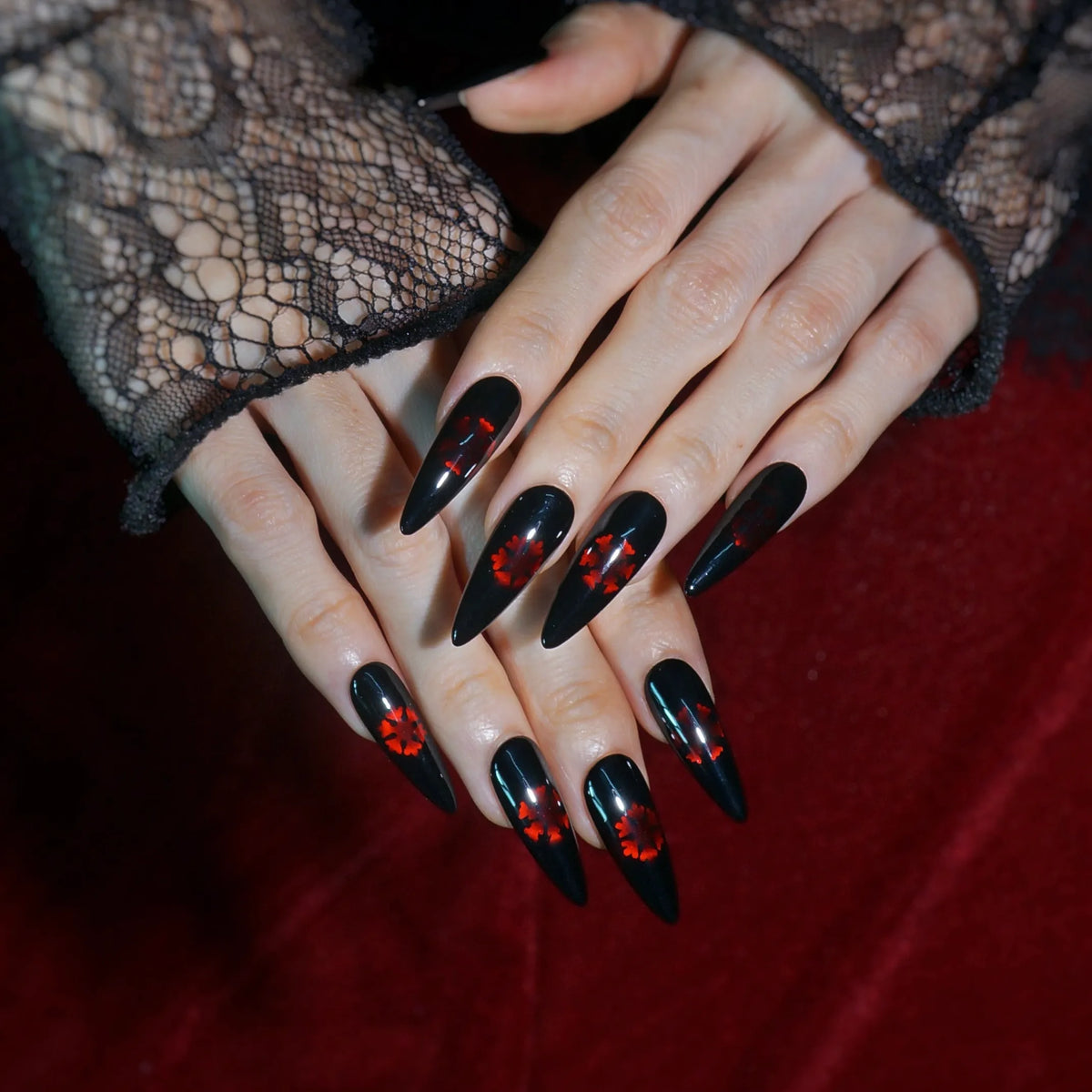 Silent Ember glossy black gothic Christmas press-on nails with red crystal snowflakes, full set on hand