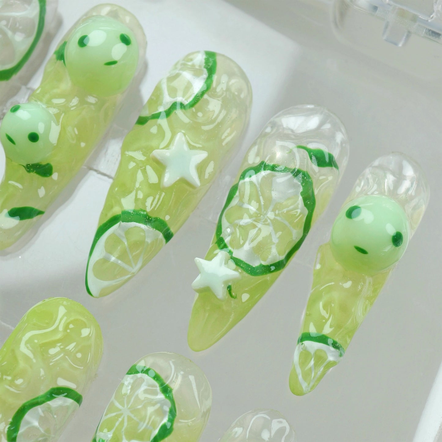 Donailsart glow-in-the-dark smiski nails with 3D citrus designs and translucent green characters for a playful, luminous finish