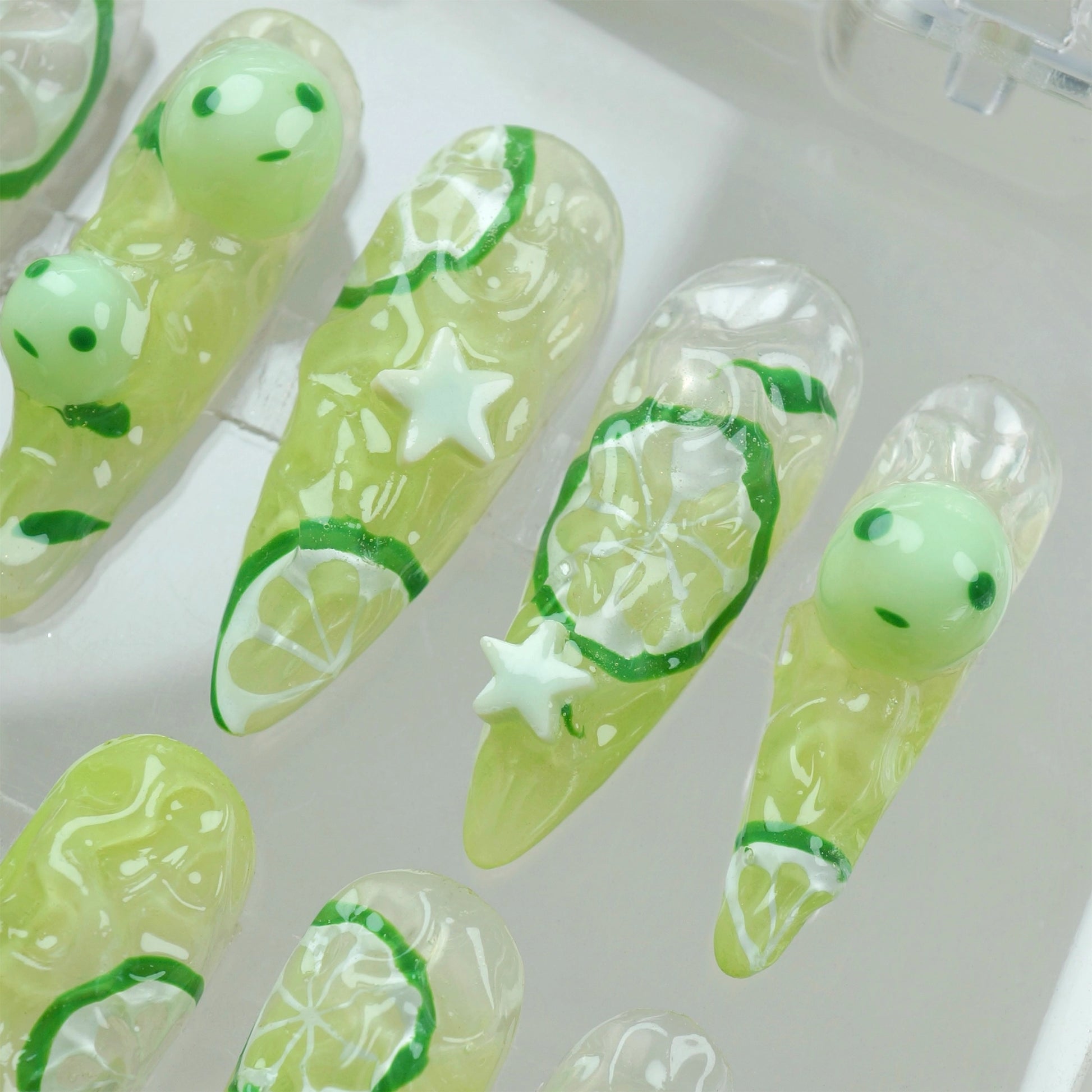 Donailsart glow-in-the-dark smiski nails with 3D citrus designs and translucent green characters for a playful, luminous finish
